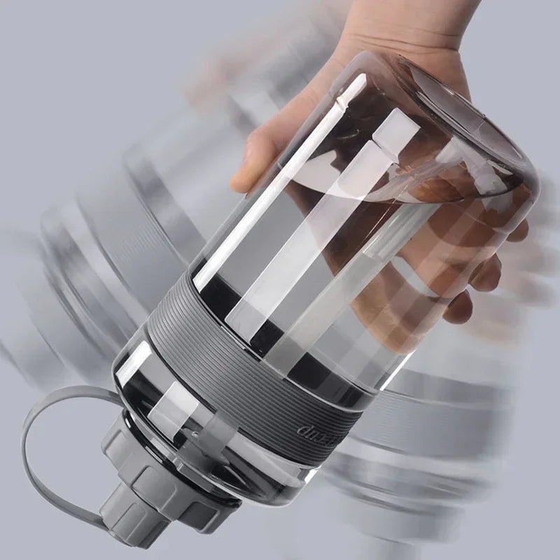 Gourde Transparente sans BPA 1L portable, facile à transporter dans un sac de sport, sac à dos ou sac de voyage pour une hydratation continue. | La  Gourde