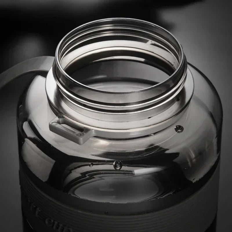 Gourde Transparente sans BPA 1L pour sport et fitness, idéale pour accompagner les entraînements et maintenir une hydratation optimale. | La Gourde