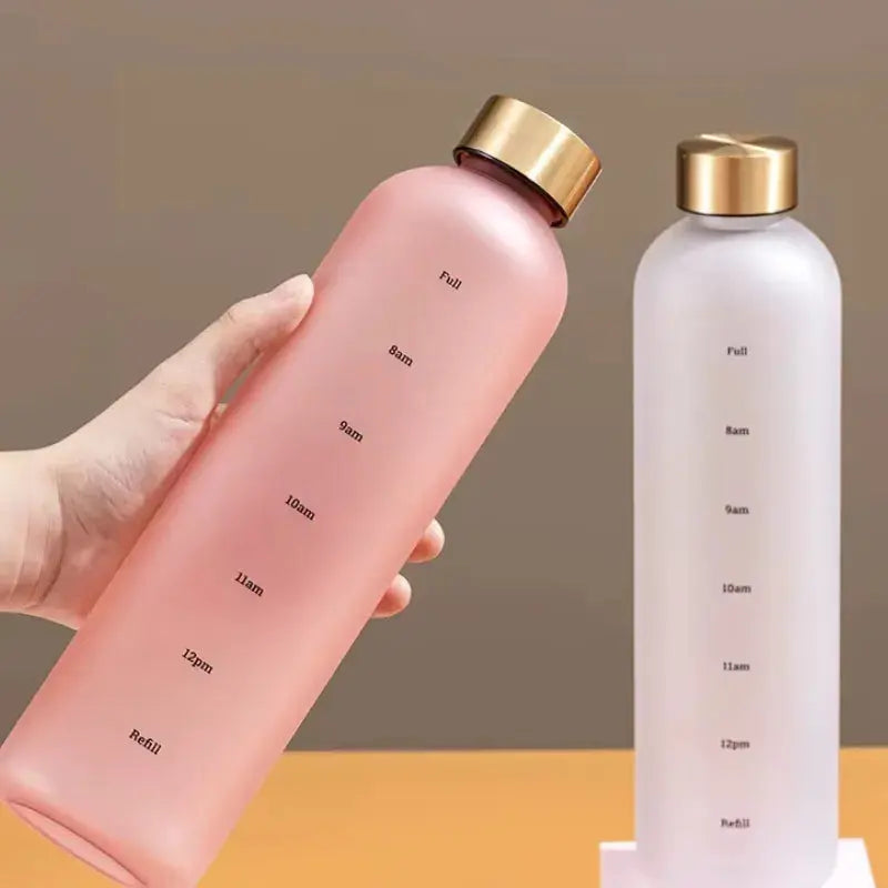 
Gourde Motivation Horaire 1L (Rose), gourde graduée heure, bouteille d'eau 1 litre, marqueur de temps, réutilisable, fitness | La Gourde®
