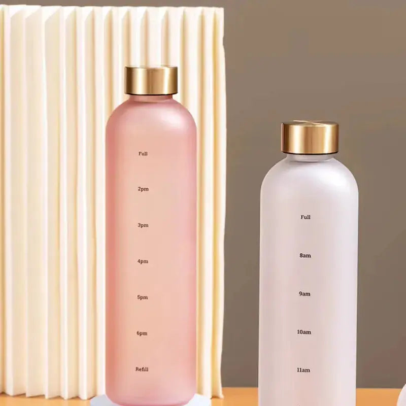 
Gourde Motivation Horaire 1L (Rose), gourde heure de la journée, gourde sport femme, anti-fuite, sans BPA, bureau | La Gourde®