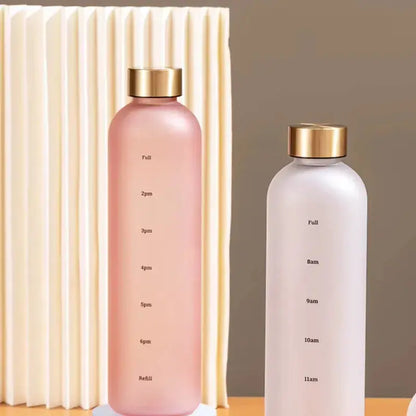 
Gourde Motivation Horaire 1L (Rose), gourde heure de la journée, gourde sport femme, anti-fuite, sans BPA, bureau | La Gourde®