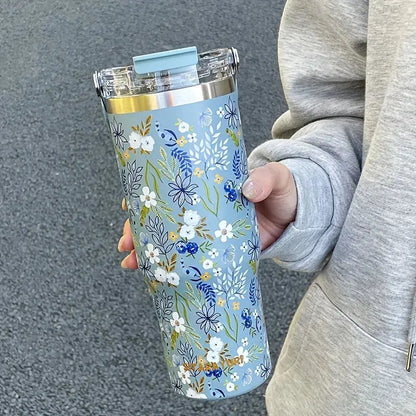 
Gourde en acier inoxydable 900 ml avec motif floral
