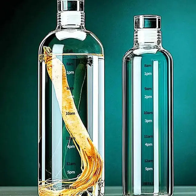 
Lot De 2 Gourde En Verre de 1L avec Graduation Horaire, bouteille d’eau en verre graduée avec repères horaires, idéale pour accompagner l’hydratation quotidienne au bureau, à la maison ou en déplacement.