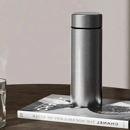 
Gourde métal titane 500 ml avec isolation sous vide
