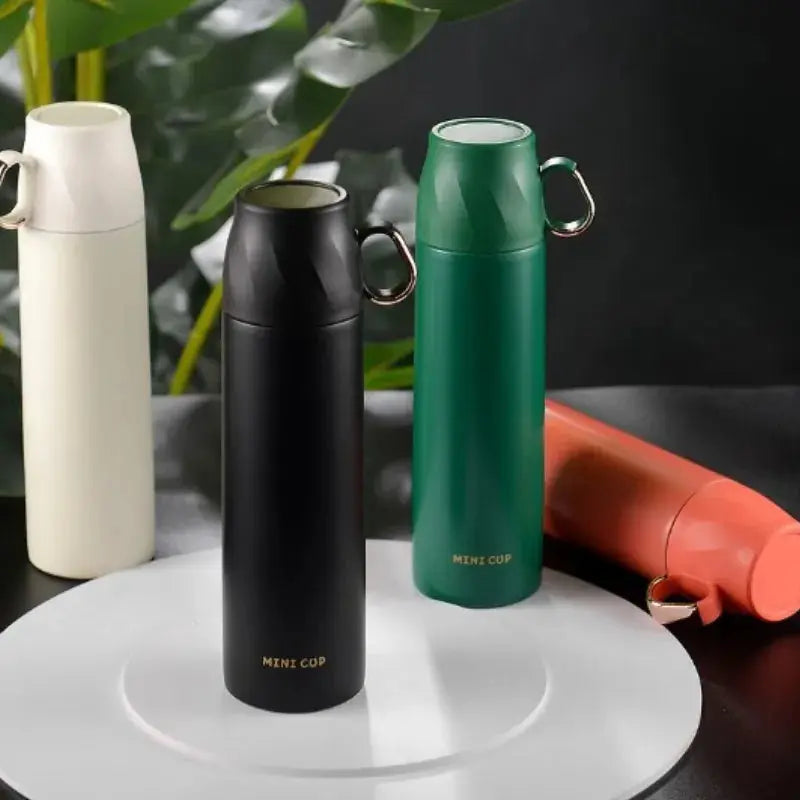 Mini Thermos Avec Tasse noir pour café et thé nomade – La Gourde ®

